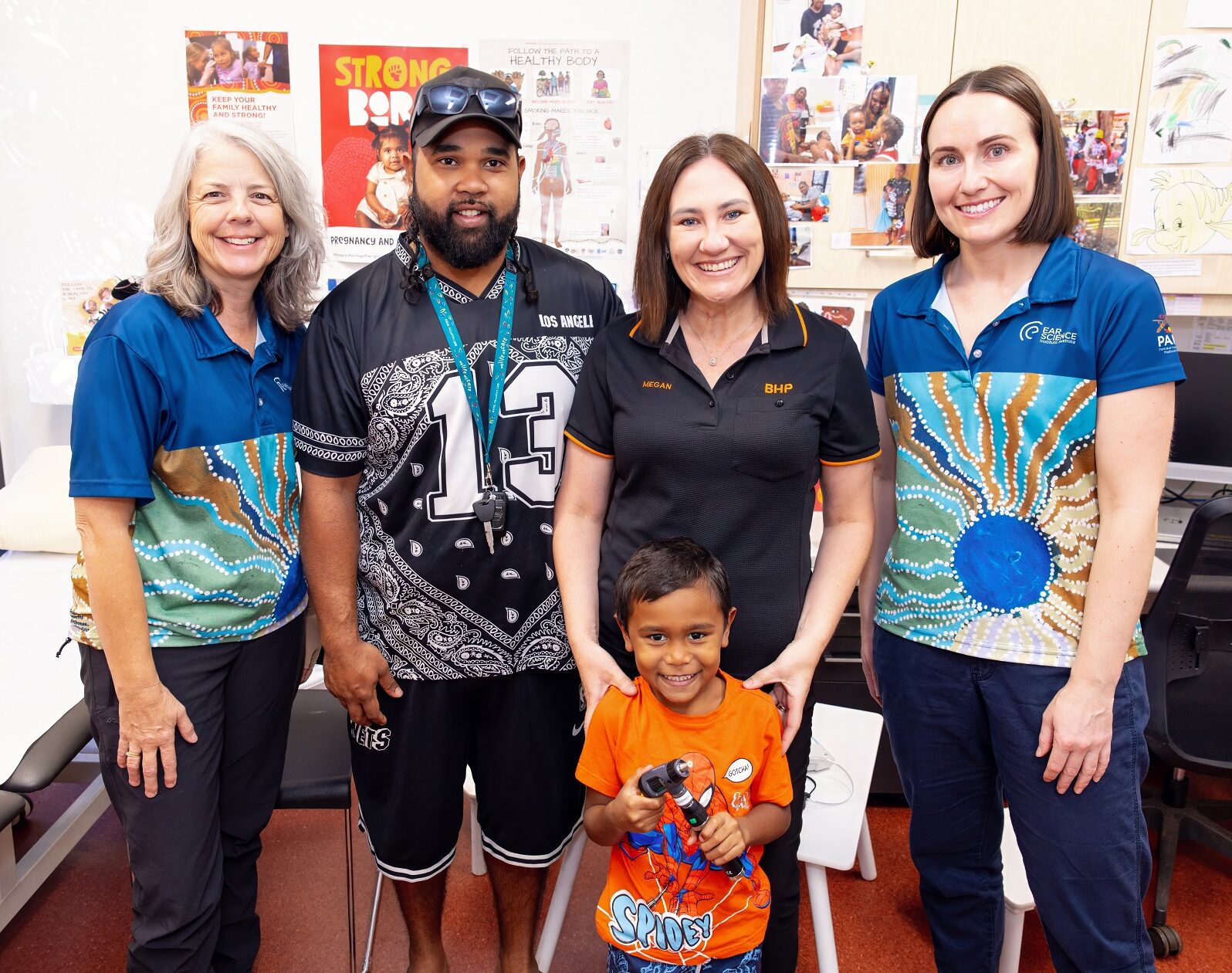 Hearing health community outreach, Aboriginal health education, Ear Science audiologist in East Pilbara, BHP partnership, Local Aboriginal families participating in hearing program